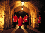 Group making their way through the Bloody Tower Archway  Britainonview.com